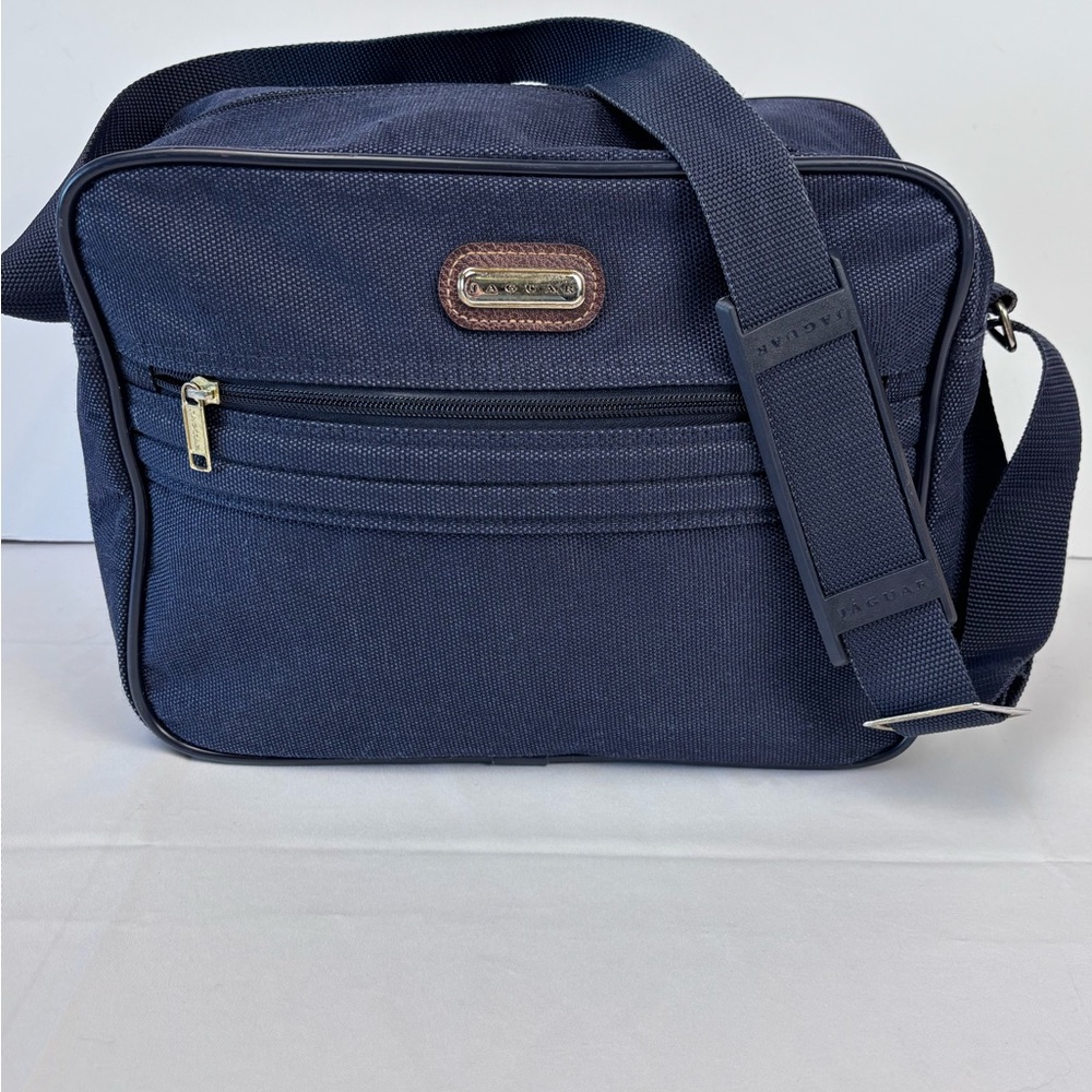 Jaguar Blue Travel Bag with Durable Fabric and Leather Accents. Nice Condition!